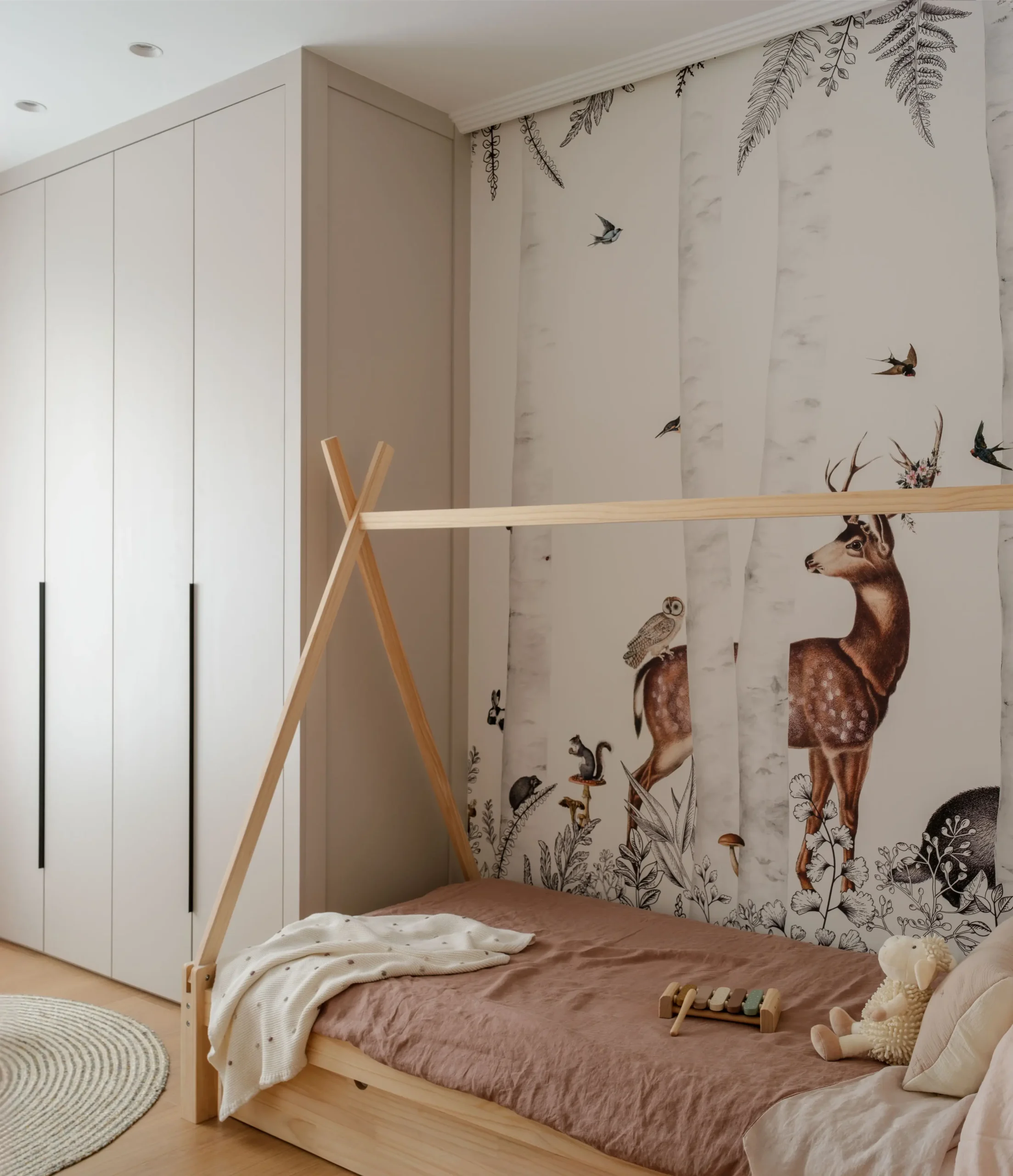Interior photography of baby bed in Etxebarri home Interior photography of baby bed in Etxebarri home